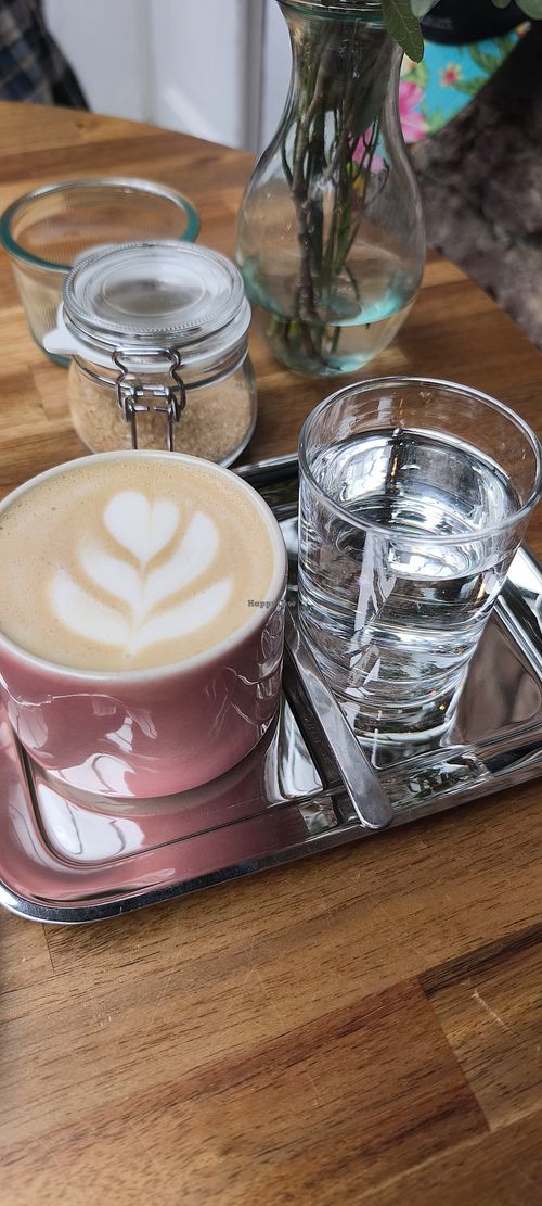 Latte with oat milk at Share Sweet & Wine Bar in Prague