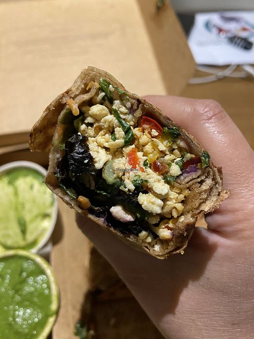 Old Delhi bhurji wrap close up (green chutney a too spicy for me but many others will enjoy)  at Greenr Cafe in New Delhi