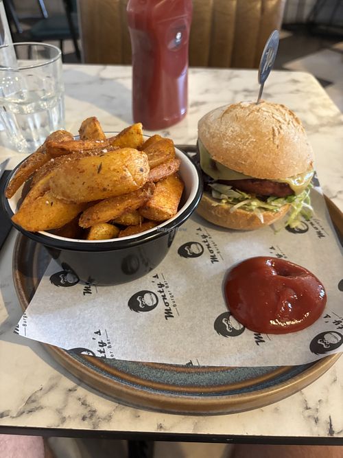 Bean burger with spicy fries   at Monty's Burger Bar in Bicester