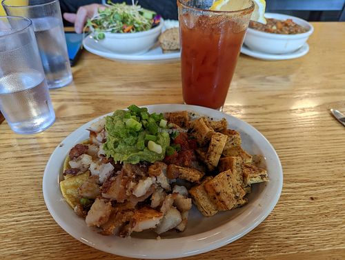 Vegan Huevos Rancheros and Bloody Mary 🤤 at Sunlight Cafe in Seattle