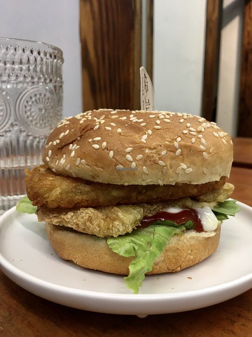 Vegan hash brown burger with bean curd patty and all the fixings  at Vegan Resort 啼岸 in Taipei