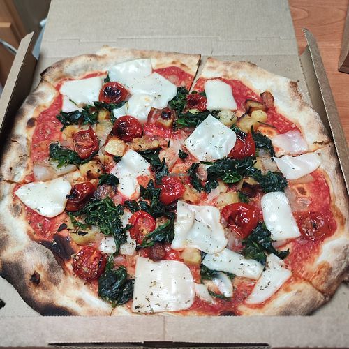 Pizza mozzarella do riso, cipolla, patate al forno. at MB Pizza in San Dona Di Piave