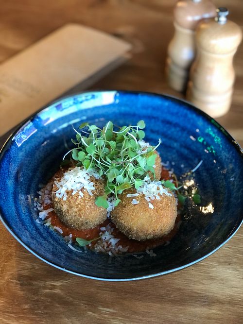 Arancini
vegetarian

Mushroom, parmesan and bocconcini arancini balls, romesco, basil, graded parmesan, micro greens at La Cantina in Tauranga