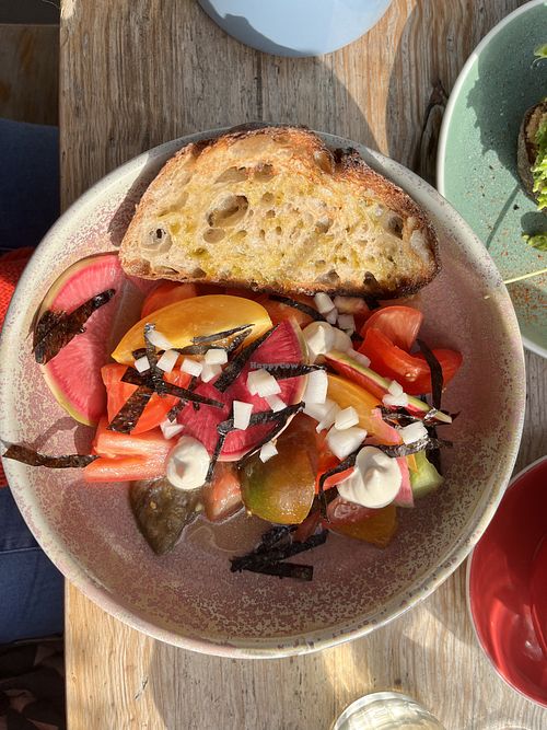 Heirloom 🍅 tomatoes with whipped miso tofu  at Friends of Ours in North London