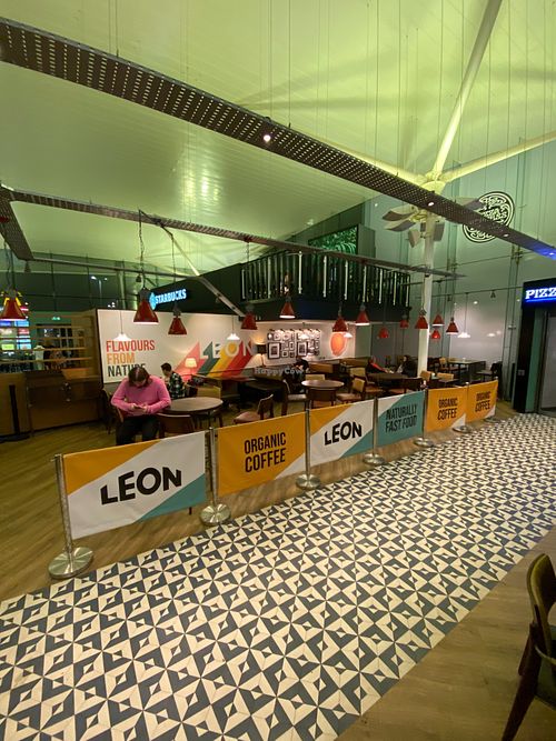 Inside seating area, there is also outside seating at the services but not the nicest view in front of the car park at Leon in Cobham