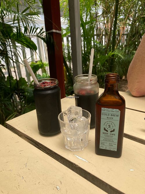 Cold brew coffee and black magic pressed juice (activated charcoal, coconut water and pineapple juice)   at Seed Cafe in Colombo