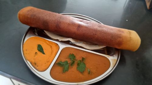 Masala Dosa 
light, soft, crispy lentil & rice  crepe filled with seasoned mashed potato served with sambar & Chutney 
Vegan/ Gluten free/ Dairy free at Udupi Flavours In Australia in Rockbank