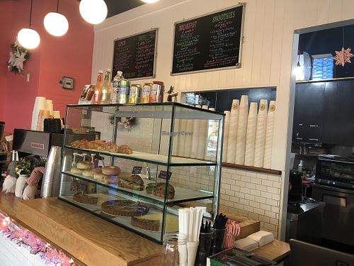 Baked goods display and menu at Glow Plant Based Revolution in New York City