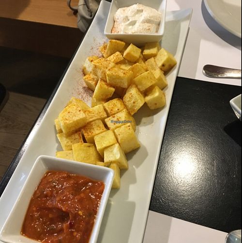patatas bravas with vegan alioli and a sweet sauce also really good at Copenhagen in Valencia