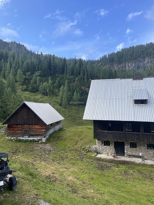 Two of the huts at this location. A restaurant hut and additional huts for accommodations.  at Krekova koča na Ratitovcu in Torka
