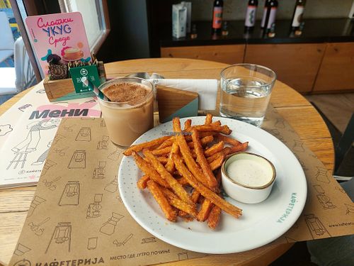 Ice chai latte 395 RSD and sweet potato fries 675 RSD at Kafeterija Niš in Nis