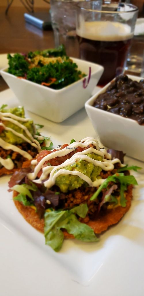 Walnut tacos with flaxseed shells, kale salad side  and black beans at Good Life Cafe in Columbia