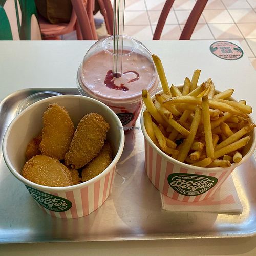 Nuggets, fries & strawberry milkshake (all GF)  at Neat - Victoria in South West London