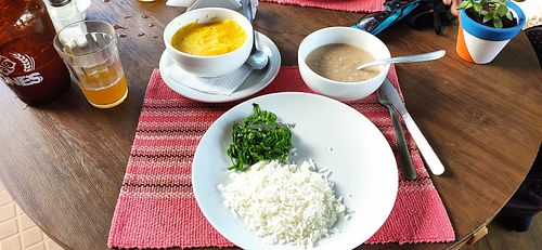 Local beer, rice and beans, puree at Ybyrá  in Sao Paulo