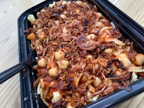Koshary: Rice, Brown Lentils, Chickpeas & Pasta w/ Tomato Sauce, topped with Fried Onions at Cairo's Kitchen in Kalamazoo