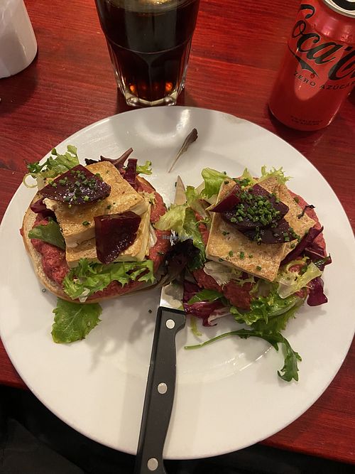 Bagel with beetroot hummus, tofu and beetroot   at Milk in Barcelona