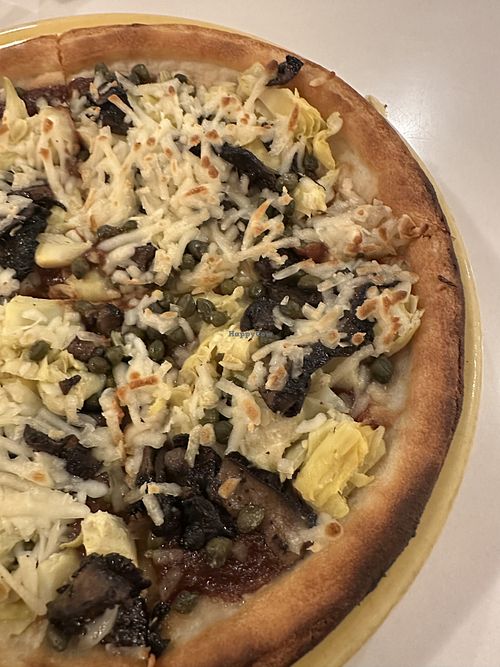 Vegan GF pizza with balsamic marinara and lots of toppings  at Amicas Pizza in Salida