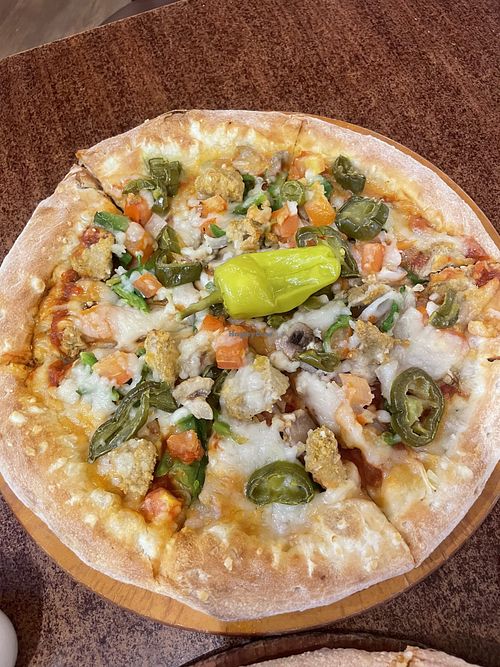   at Papa John's in Abu Dhabi