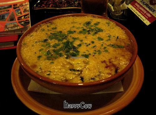 A dish with fried zucchini and vegan Bechamel sauce. at Siwa in Brno