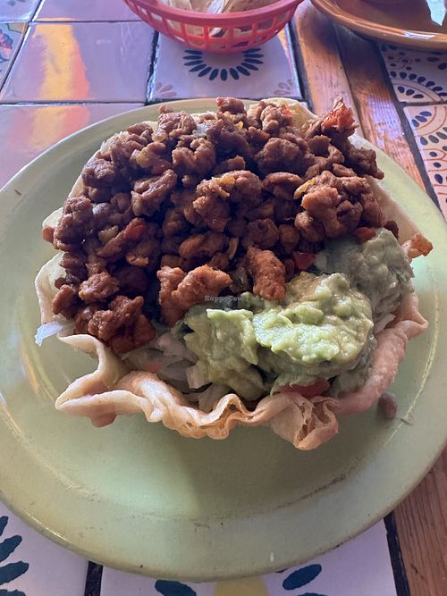 Small taco salad with beefless grounds, contains beans, lettuce, tomato, beef, guacamole (ask for not cheese no sour cream). Great value.   at Jimmy Carter's in San Diego