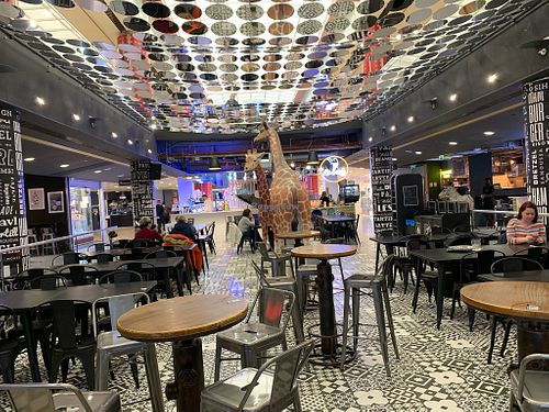 Main seating area in the food court  at Kitchen Market in Lille