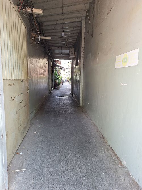 Follow down this alley at Bon's Vegan Bistro in Ho Chi Minh City