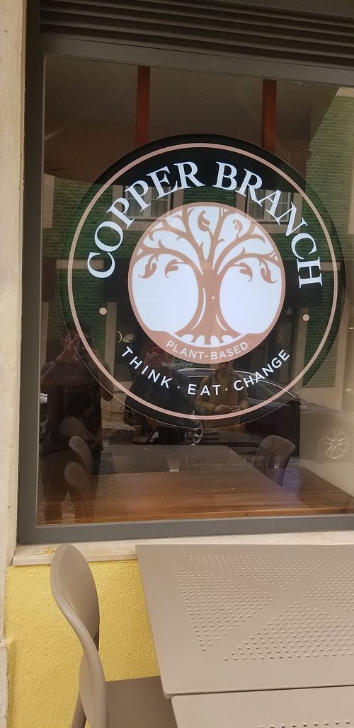Sign in the window at Copper Branch in Lisbon