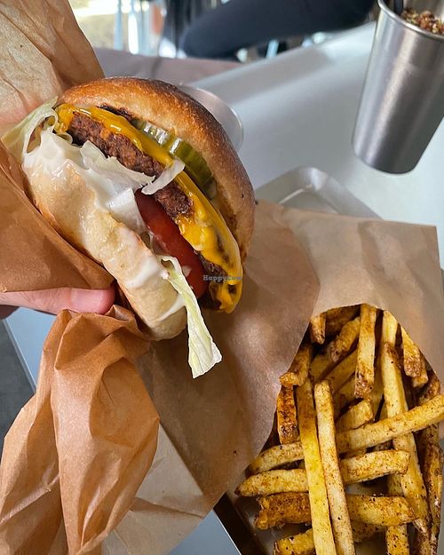 Burgers with extra cheese at Ameaça Vegetal in Lisbon