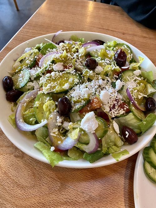 Mushroom Shawarma Feast For Two includes marinated and grilled shawarma tower (portobello mushrooms), Greek rice, salad, steamed veggies, tzatziki, hummus, pita  at Graze Kitchen  in Las Vegas