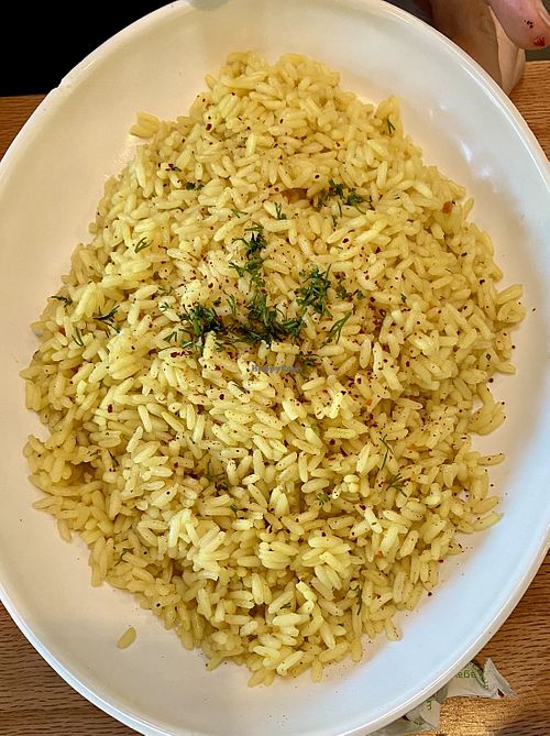 Mushroom Shawarma Feast For Two includes marinated and grilled shawarma tower (portobello mushrooms), Greek rice, salad, steamed veggies, tzatziki, hummus, pita  at Graze Kitchen  in Las Vegas