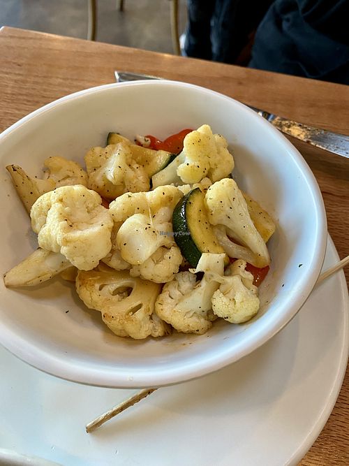 Mushroom Shawarma Feast For Two includes marinated and grilled shawarma tower (portobello mushrooms), Greek rice, salad, steamed veggies, tzatziki, hummus, pita  at Graze Kitchen  in Las Vegas