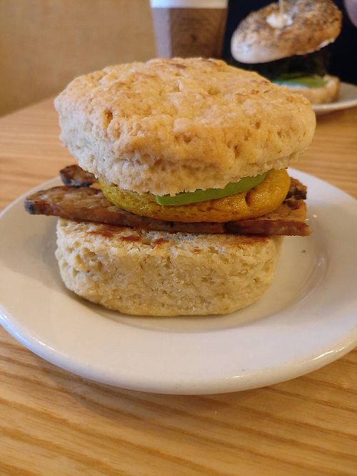 Biscuit with egg, tempeh bacon, and avocado at Dulce Vegan Bakery and Cafe in Atlanta