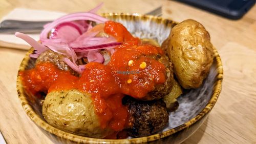 Smoked salted & garlic potatoes with hot fermented sauce & pickled onions at Corto Bar in Clitheroe