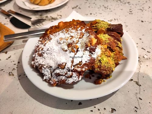 Stuffed and topped croissant and pain au chocolat with pistachios, almonds and hazelnuts at Saint-Jean in Amsterdam
