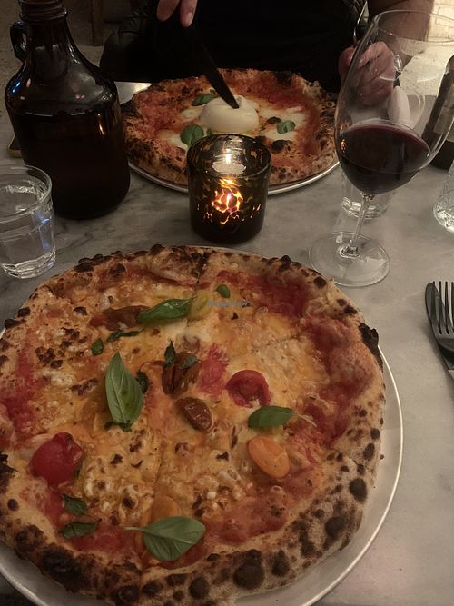 Vegan cheese margarita with added cherry tomato. Bellissimo!    at Somedays Pizza in Noosa Heads