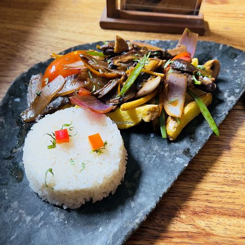 Lomo saltado with mushrooms main course as part of 15 sol lunch menu  at Salvajes in Cusco