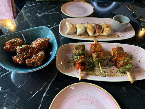 Cauliflower bites, plant based gyozas, bbq tofu bites   at Vegan Pind in Staines-upon-thames