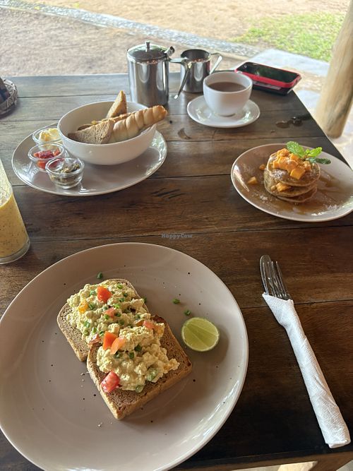Scrambled tofu, pancakes, bread basket   at THE SLOW in Mirissa