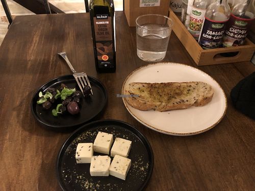Blue cheese with olives on bread is a tasty starter coming soon  at VegANGELov  in Belgrade