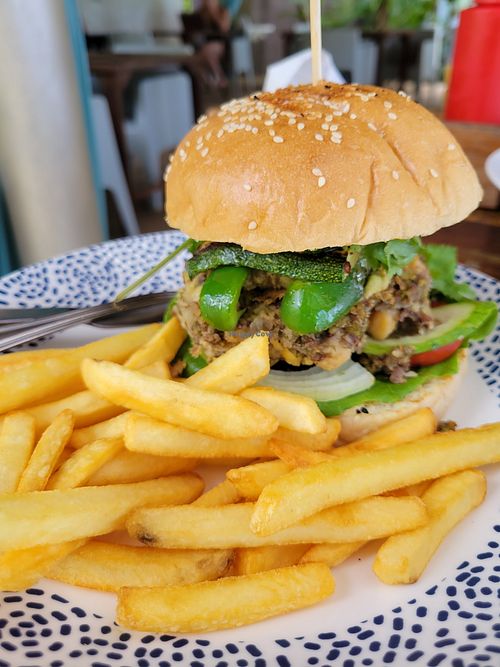 Lentil burger with fries. Burger falls apart, ask to use separate oil. at Secret Beach Bar and Grill in Koh Phangan