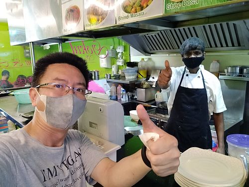 Double thumbs up with chef at Gokul Vegetarian Restaurant - Fortune Centre in Central Singapore