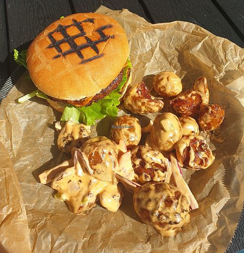 Vegan burgers with lovely baked and fried potatoes. at Stracta Bistro in Hella