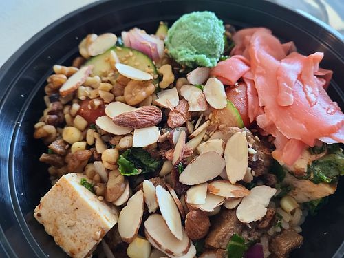 Vegan steak poke bowl with Wasabi, almonds, kale and white sesame seeds at PokeBox in Nags Head