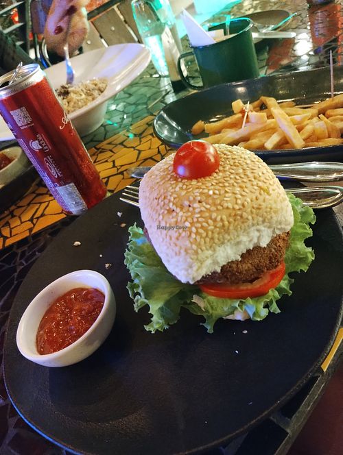 Chickpea burger, fungi risotto and French potatoes  at Na Mata Café in Belem