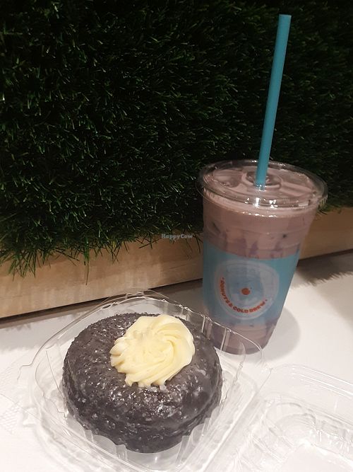 Purple Topper (v) - Purple Glazed Ube donut w/ [vegan] buttercream & Purple Reign iced chai tea at Everglazed Donuts & Cold Brew in Lake Buena Vista