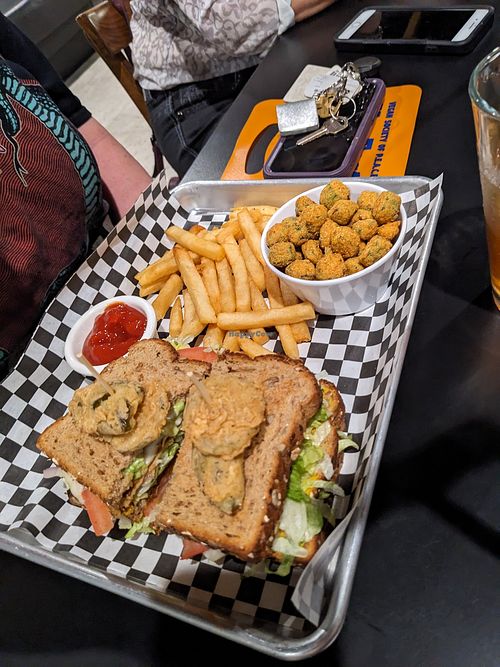 Fried okra, fries, sandwich at the hive vegan eatery in Houston