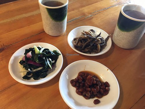 Complimentary side dishes and hot tea! Eggplant, beans, and seaweed side dishes this time. These revolving side dishes (ban chan) are so fun!  at Gangnam Style Korean Kitchen in Syracuse
