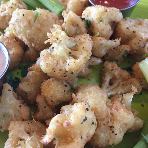 cauliwings.  trust me the siracha tofu alioli is divine  at Lotus Leaf Cafe in Wichita