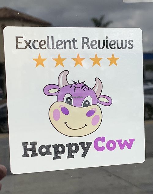I work for HappyCow so I gave them a new window decal.  at The Vegan Joint in Woodland Hills