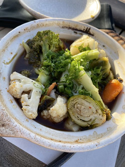 Roasted baby vegetable nabe - amazing soy, garlic, yuzu and scallion vegan broth.  at CanoeHouse in Waimea